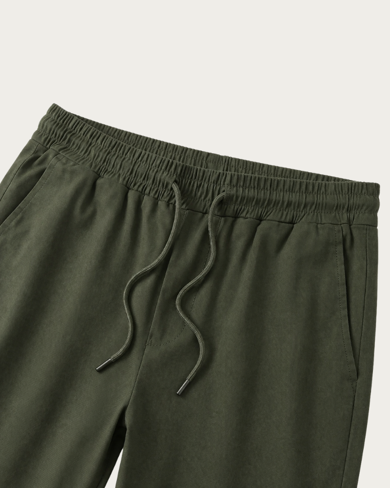 close up of trousers elastic waistband and drawstring detail