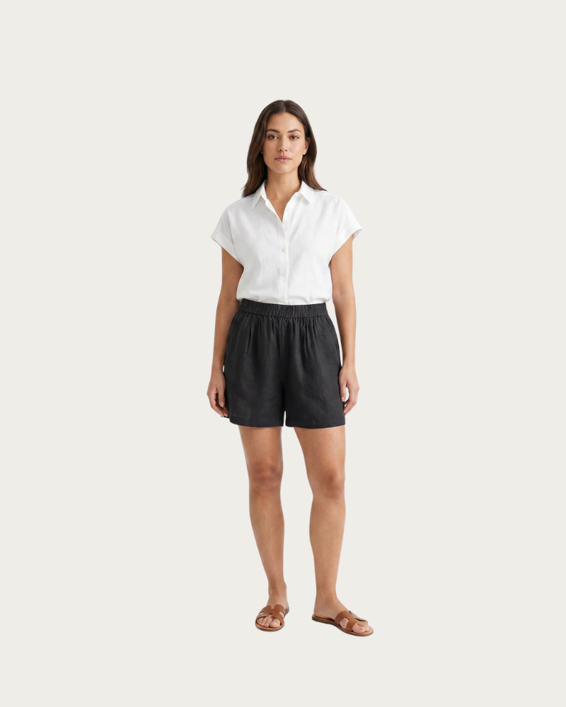 woman wearing black linen shorts full body casual outfit