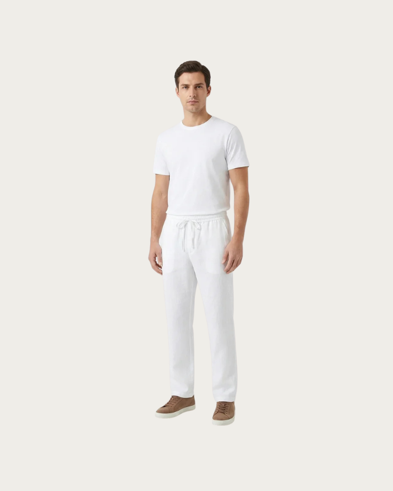 man wearing white linen trousers full body clean outfit