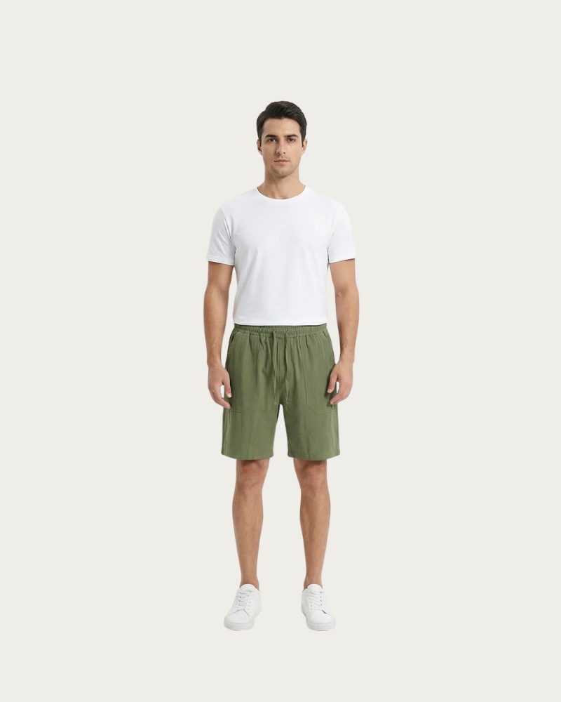 man wearing olive linen shorts full body casual outfit