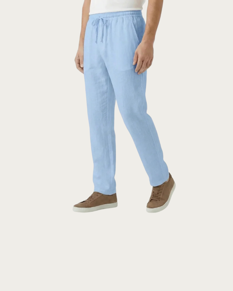 man wearing light blue linen trousers straight leg summer styling