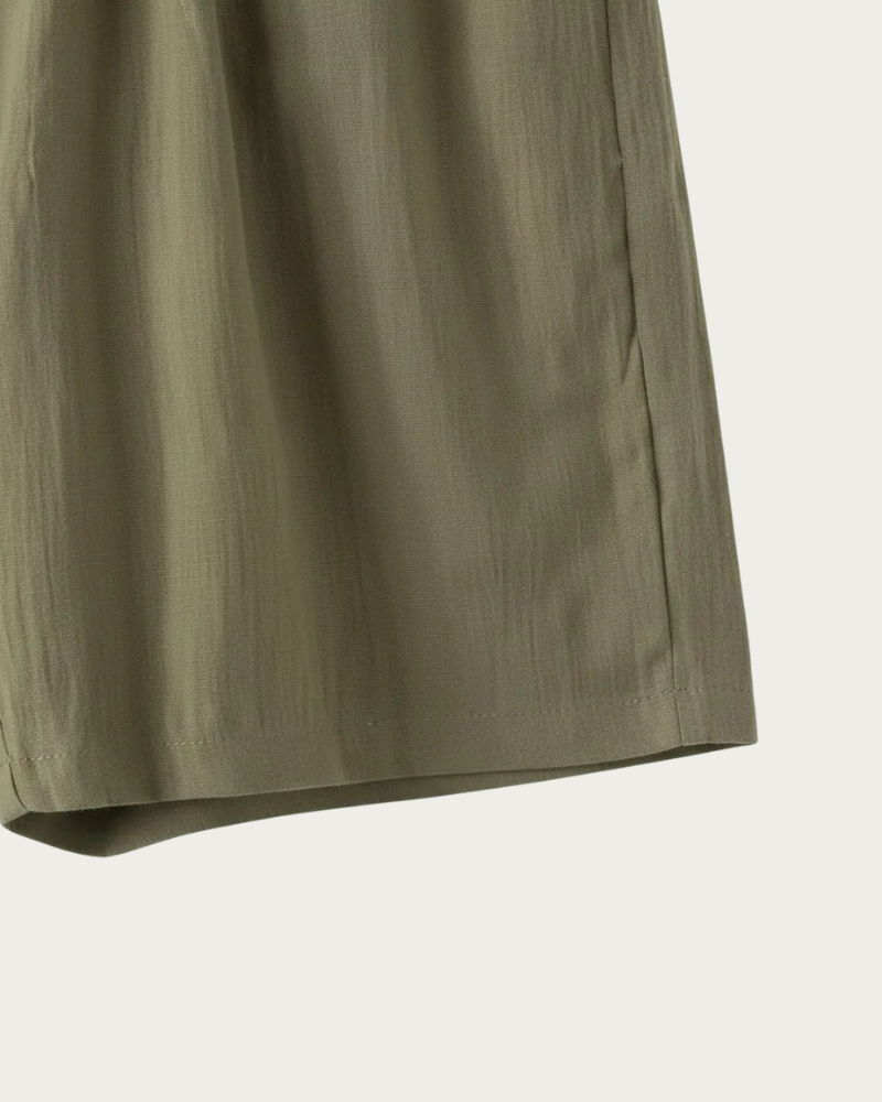 olive linen shorts fabric detail close up texture