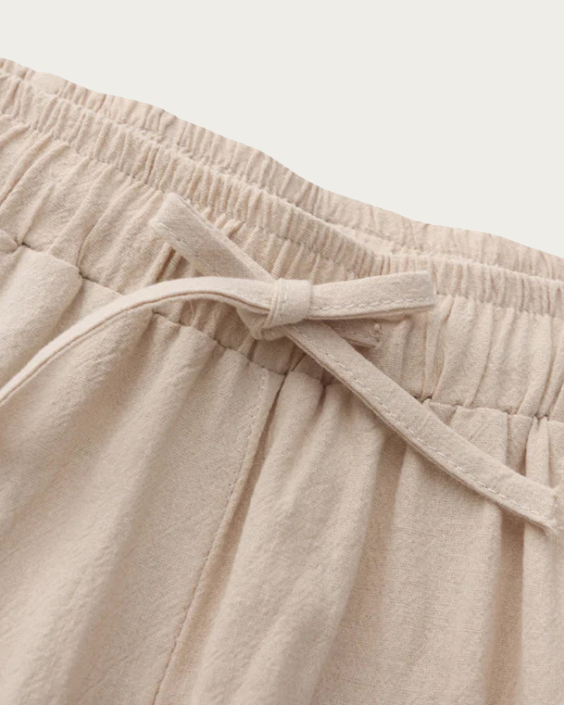 Close Up Of Linen Trousers Waistband And Drawstring Detail
