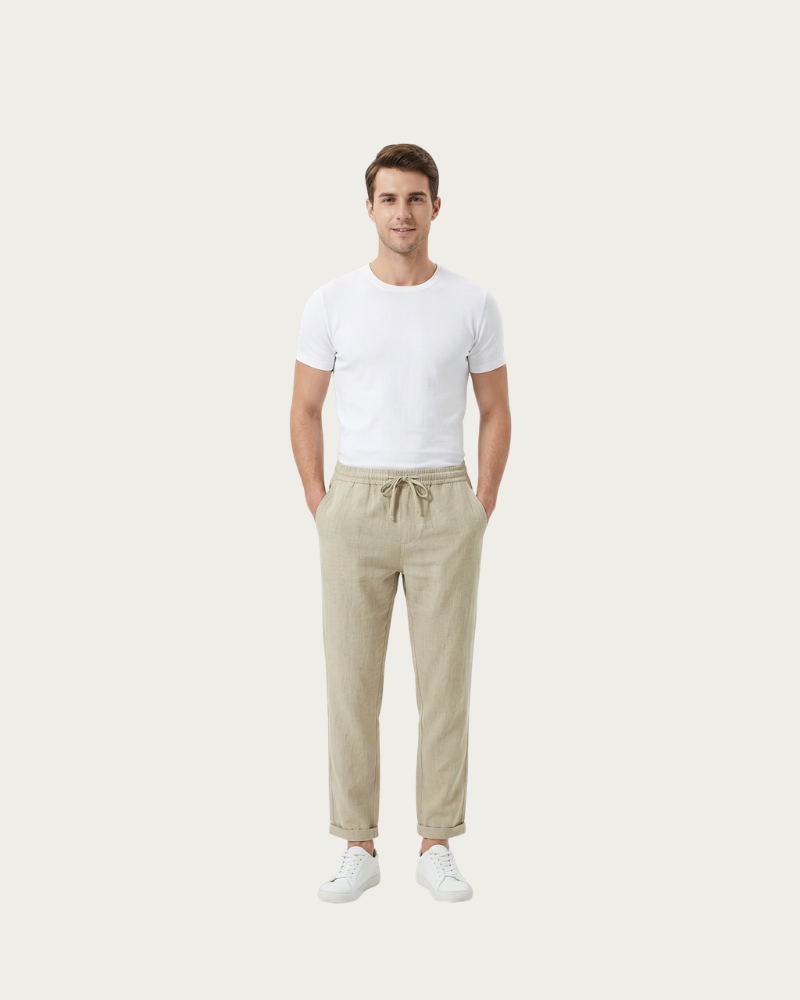 man wearing beige trousers full body casual summer outfit