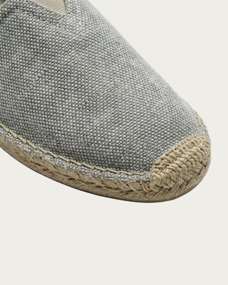 Close Up Of Grey Loafers Fabric And Sole Detail
