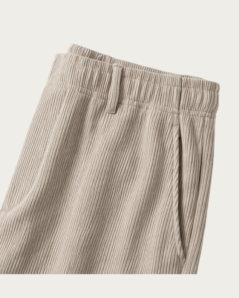 Close up of trousers waistband and fabric detail