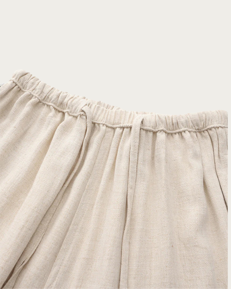 Close Up Of Elastic Waistband Linen Trousers Detail