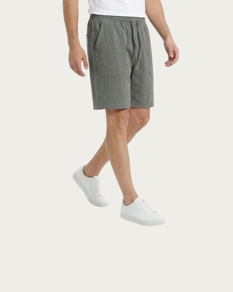 olive linen shorts men front view relaxed fit drawstring waist