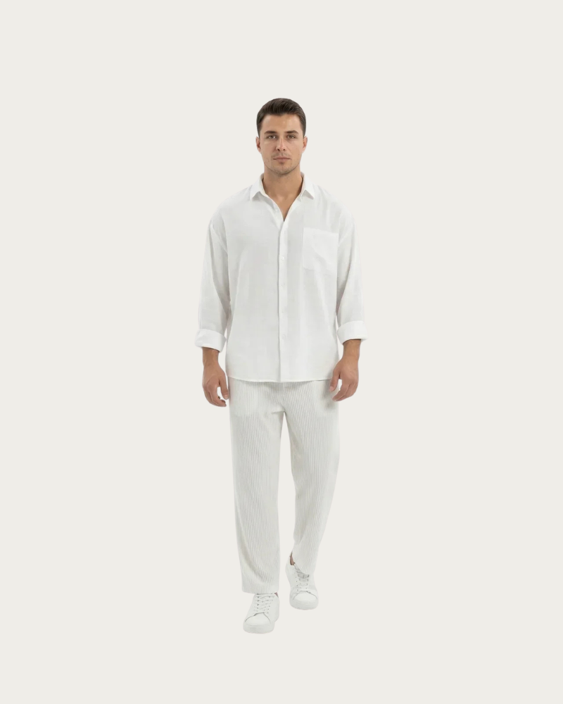 Man wearing white wide leg trousers casual summer outfit