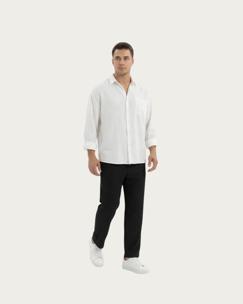 Man wearing black wide leg trousers casual outfit full body