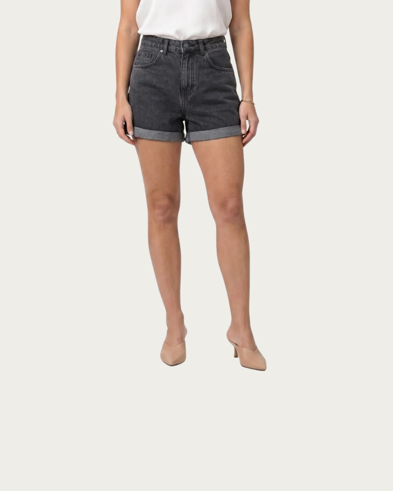 woman wearing dark denim shorts front view summer styling