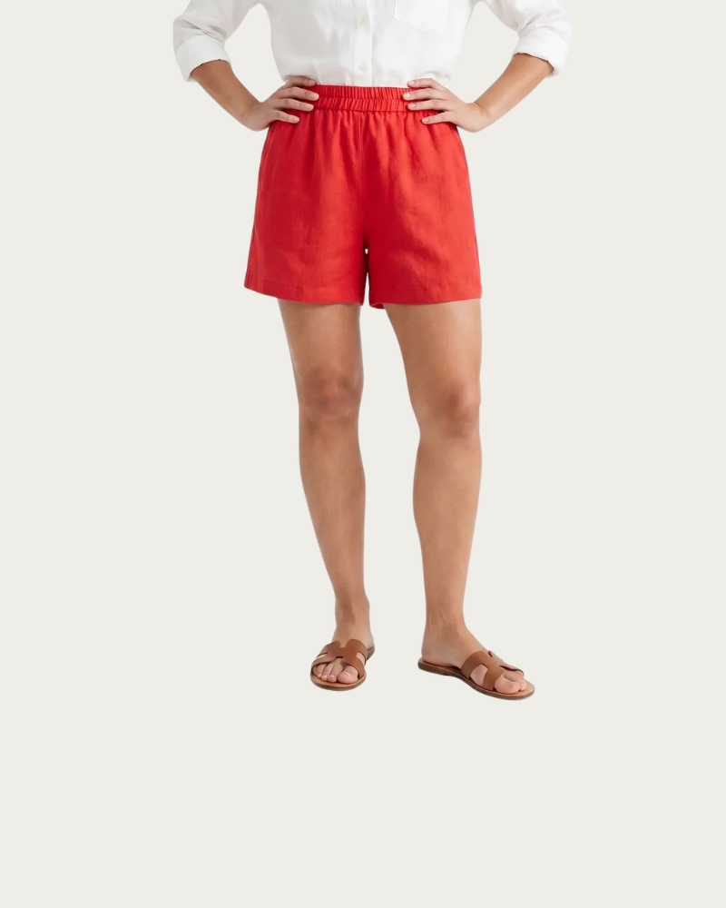 woman wearing red linen shorts front view casual look