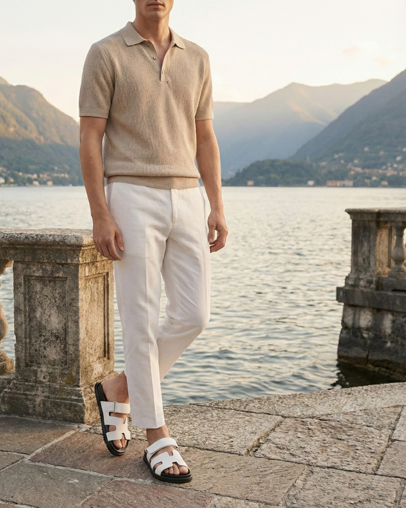 man wearing white sandals walking outdoor summer look