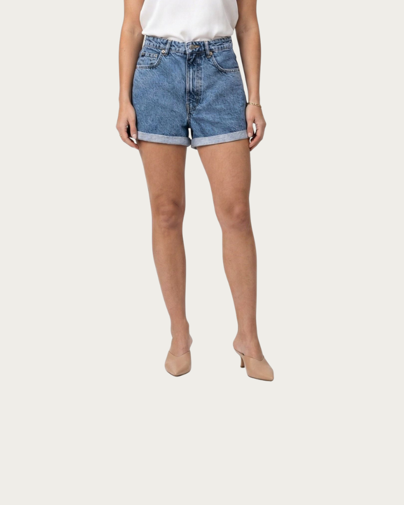 woman wearing blue denim shorts front view casual outfit