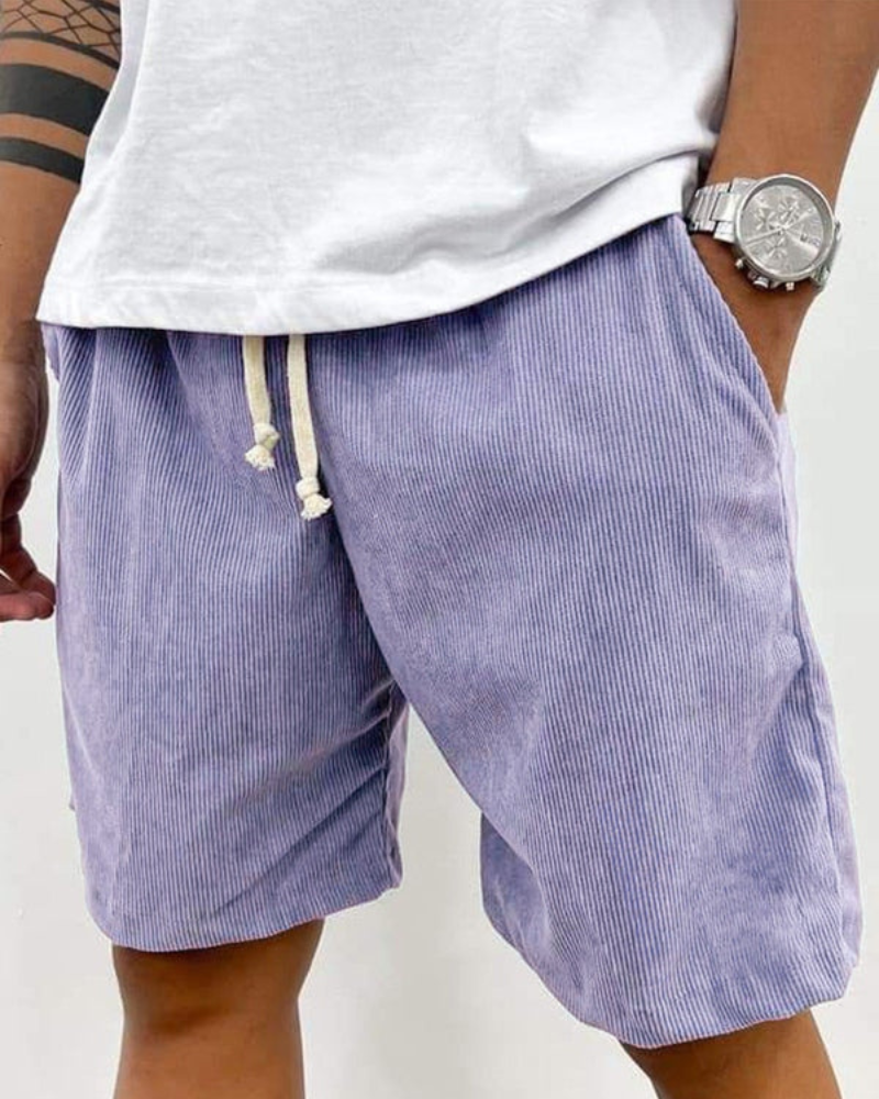 man wearing purple corduroy shorts summer outfit relaxed fit