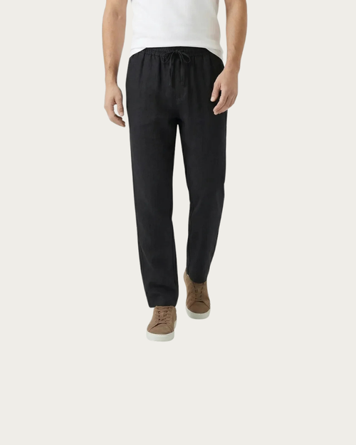 man wearing black linen trousers full body casual outfit